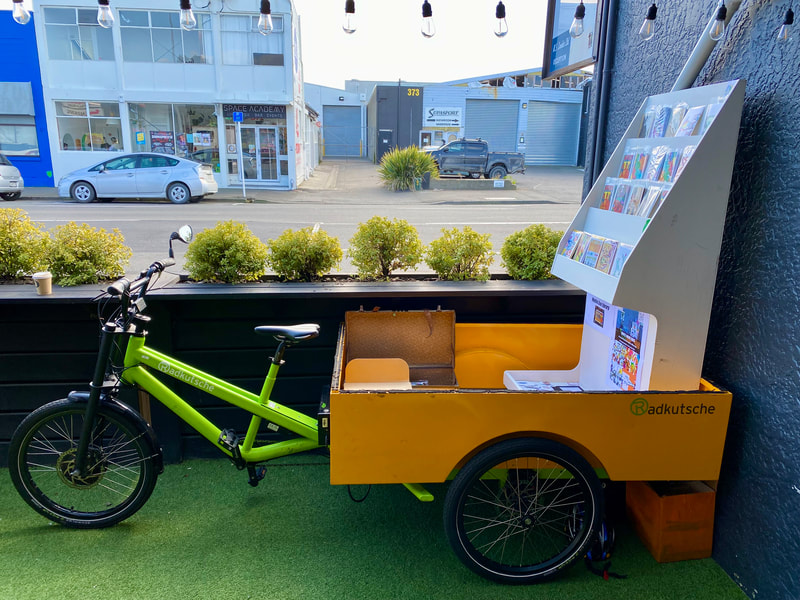 A 3 wheel trike called the White Room On Wheels and used for the Ōtautahi Zinefest